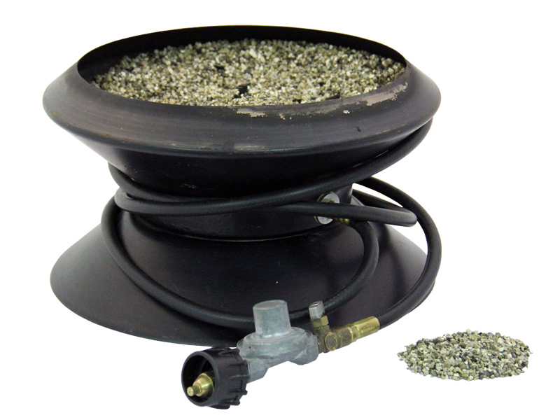 The burner base is filled with a large amount of crushed, loose vermiculite.<br/>
<strong>Note:</strong> Source of vermiculite is unknown.